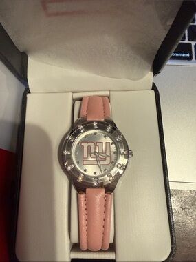 NFL Pink Leather Strap Watch with Team Logo Dial